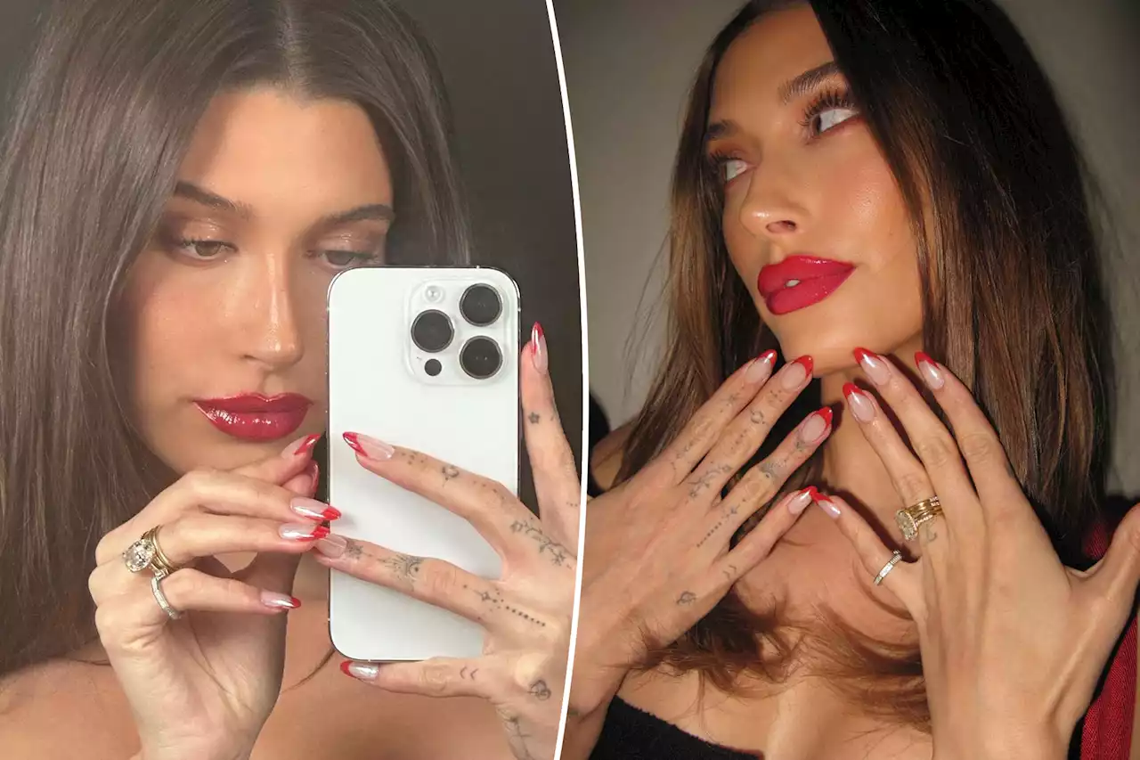 Hailey Bieber debuts festive holiday manicure, matching red lipstick