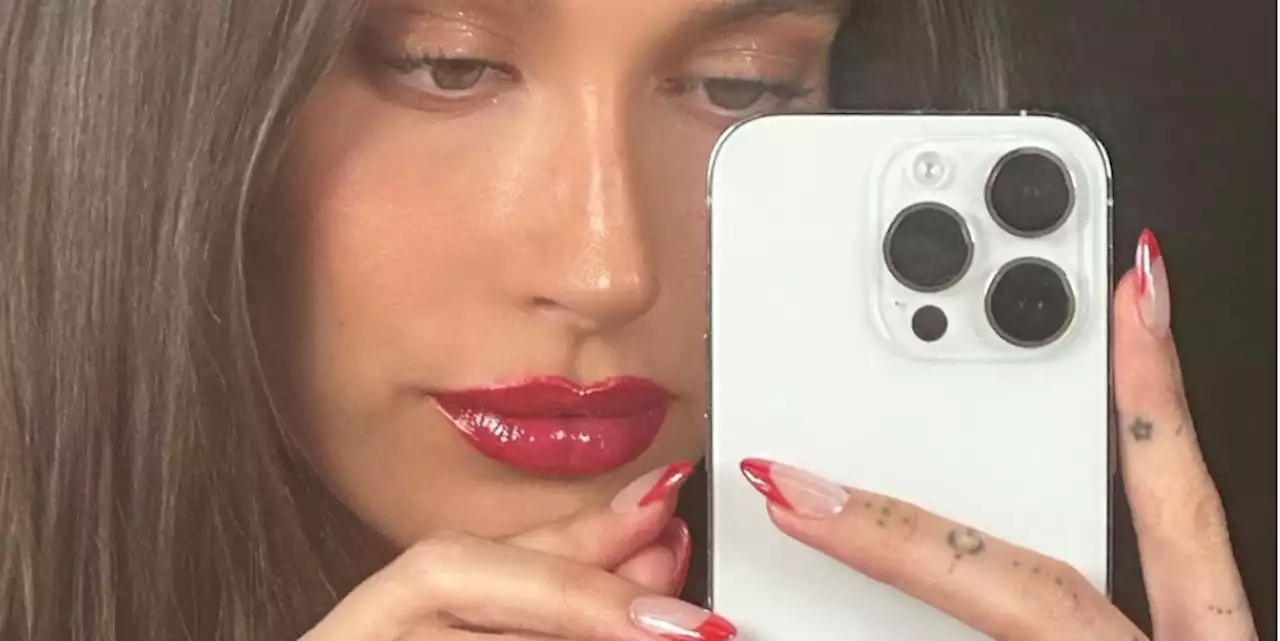 Hailey Bieber Gives Her Viral Glazed Donut Nails a Holiday, Candy Cane-Themed Update