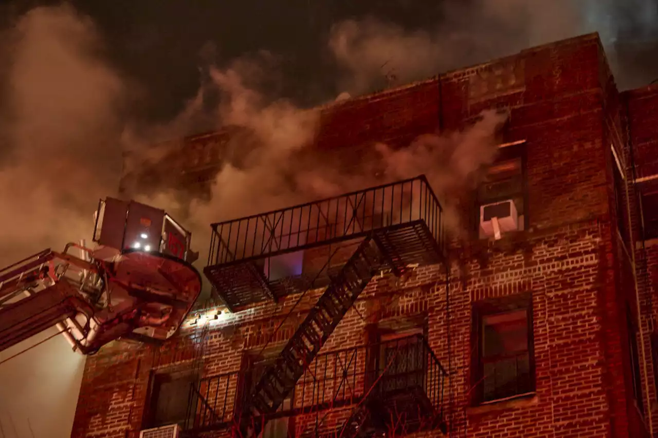 Intense four-alarm fire in Brooklyn rips through apartment building, injures four | amNewYork