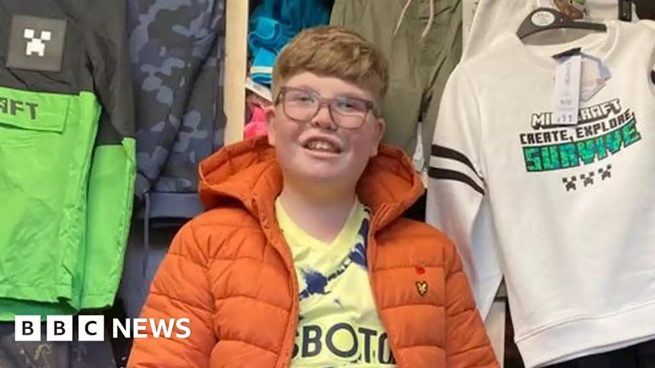 Disabled boy walks unaided for 'clothes poverty' fundraising