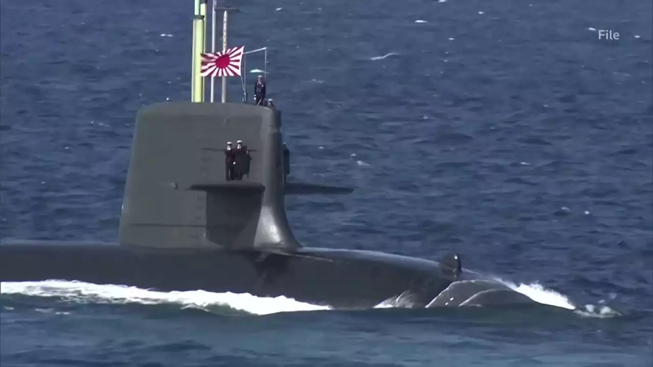 Pacifist Japan unveils biggest military build-up since World War Two