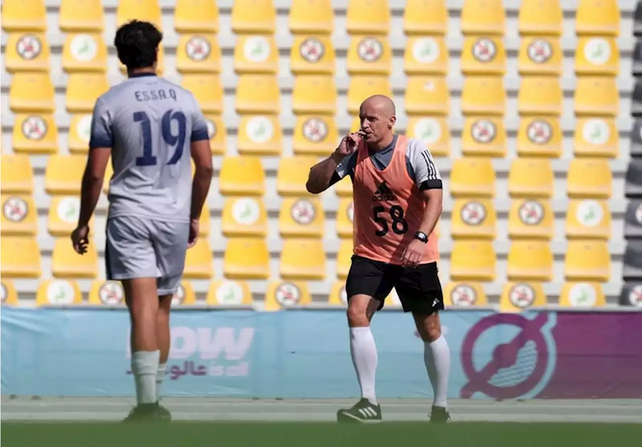 Soccer-After heart illness, referee Marciniak all smiles ahead of World Cup final