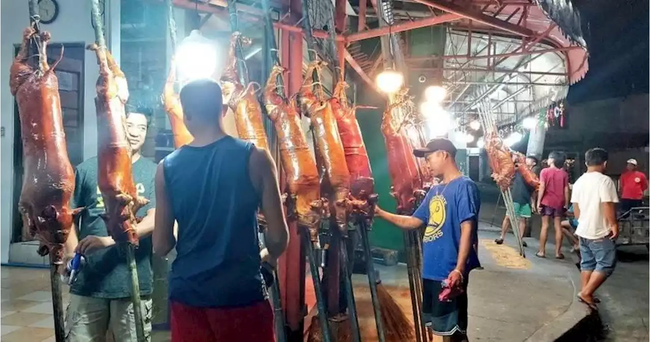 Lechon prices go up in La Loma, QC as orders come in for holiday parties