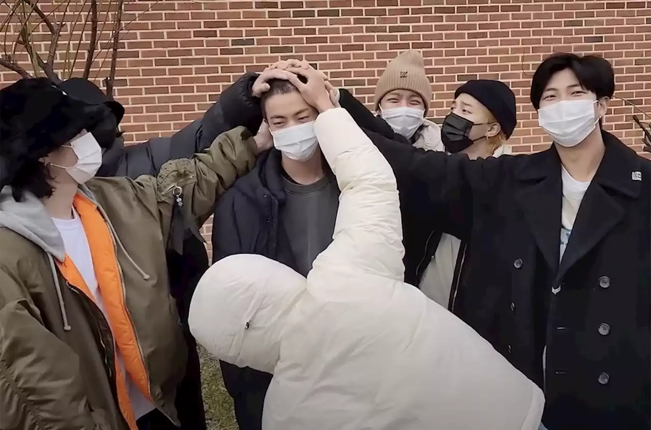 Watch BTS Send Jin Off to Military Camp & Rub His Newly Buzzed Hair in Heartwarming, Intimate Video