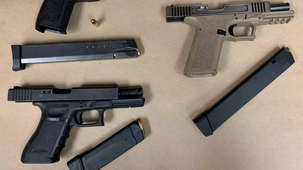 2 arrested for drinking, carrying guns in Everett park