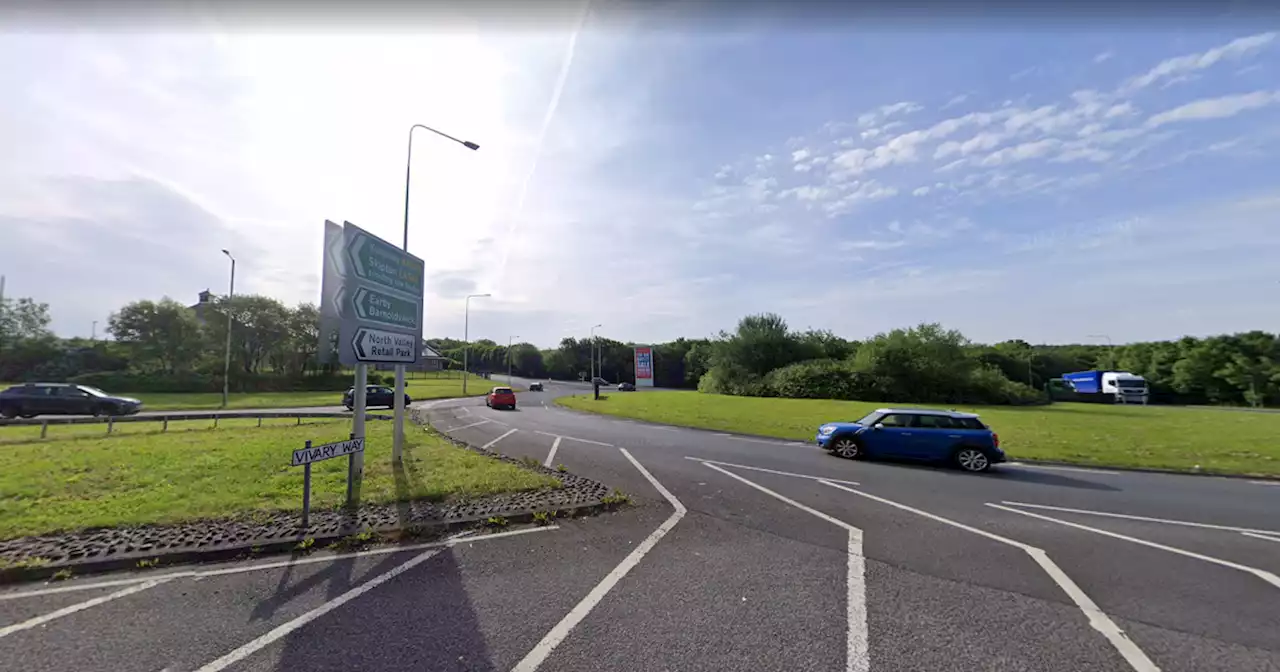 Two police officers and 19-year-old injured after Colne roundabout crash