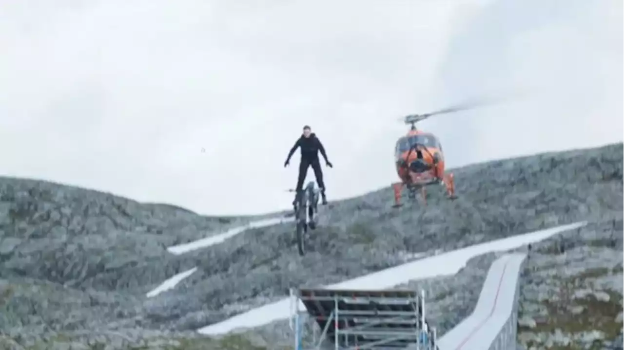 Watch Tom Cruise Drive a Motorcycle Off a Mountain in Ridiculous Mission: Impossible - Dead Reckoning Stunt