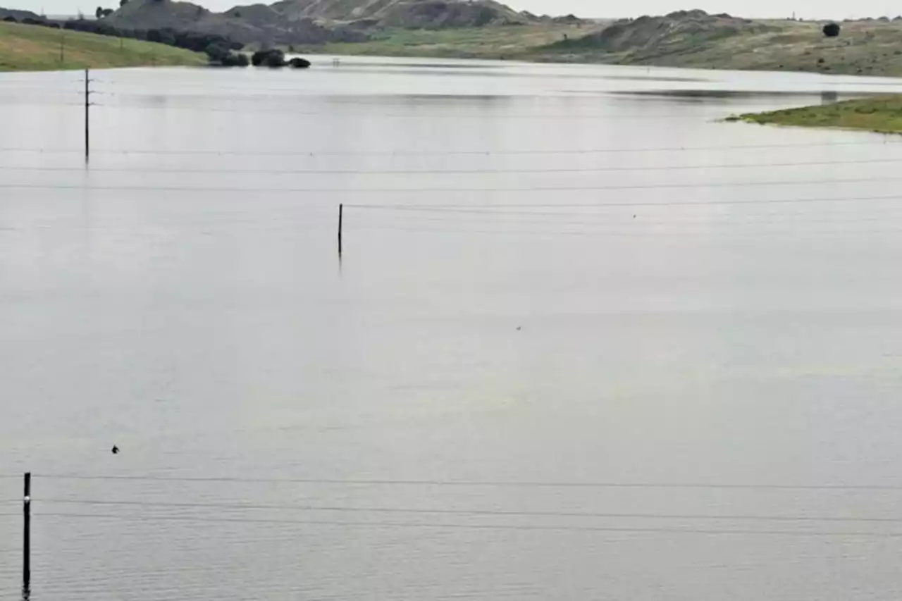 PHOTO: Hendrina outage – Eskom power lines submerged in dam | The Citizen