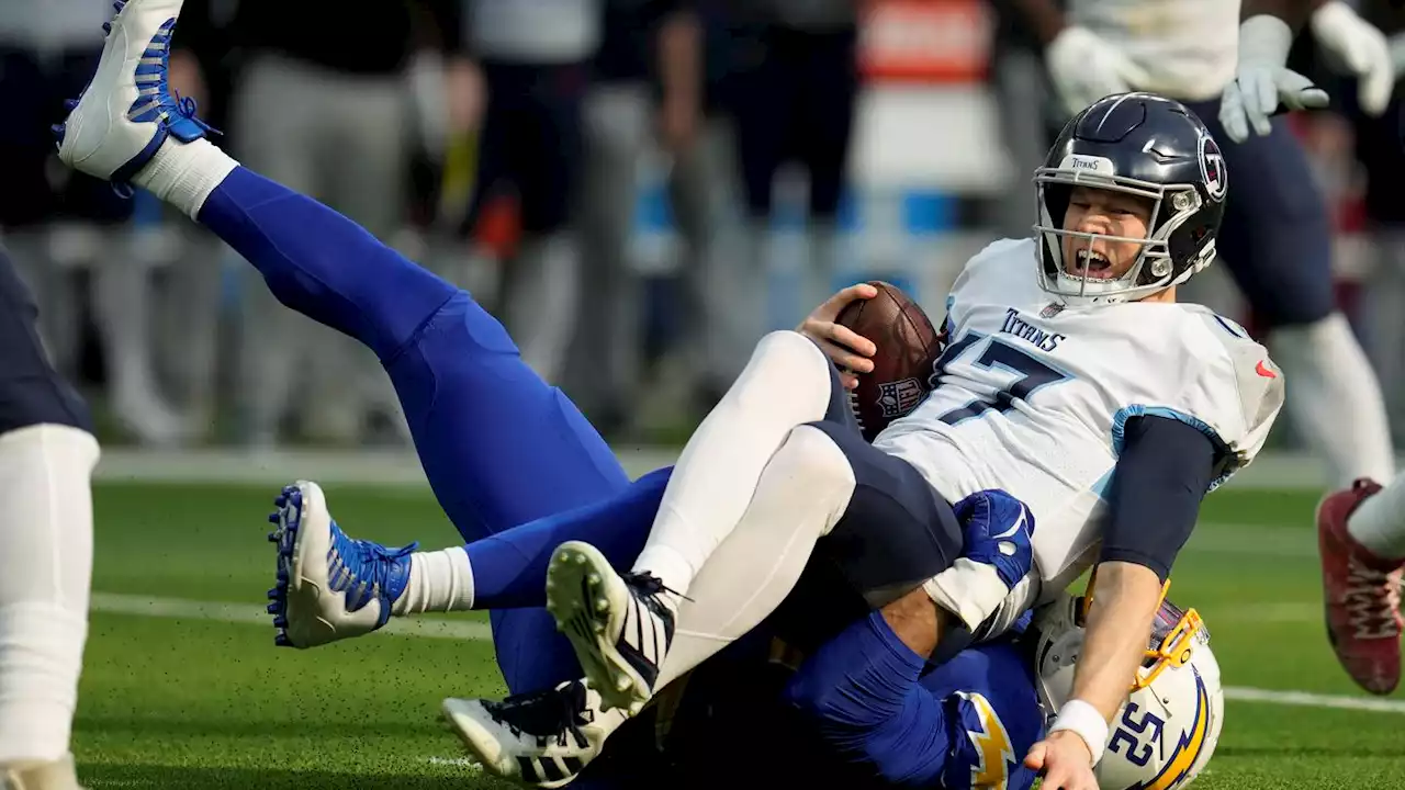 Titans QB Ryan Tannehill carted off after Khalil Mack's tackle injures his leg