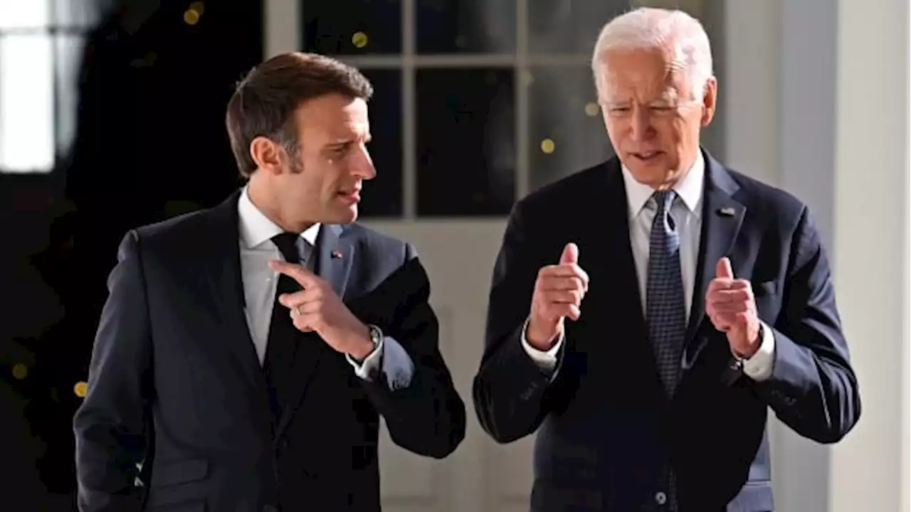 Biden, Macron vow to hold Russia accountable for Ukraine 'war crimes' | CBC News