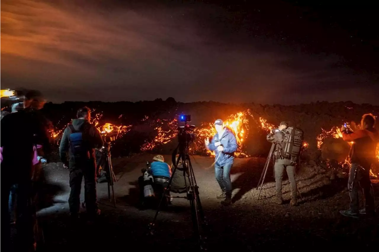 Visitors flock to Hawaiian volcano to see glowing lava flow