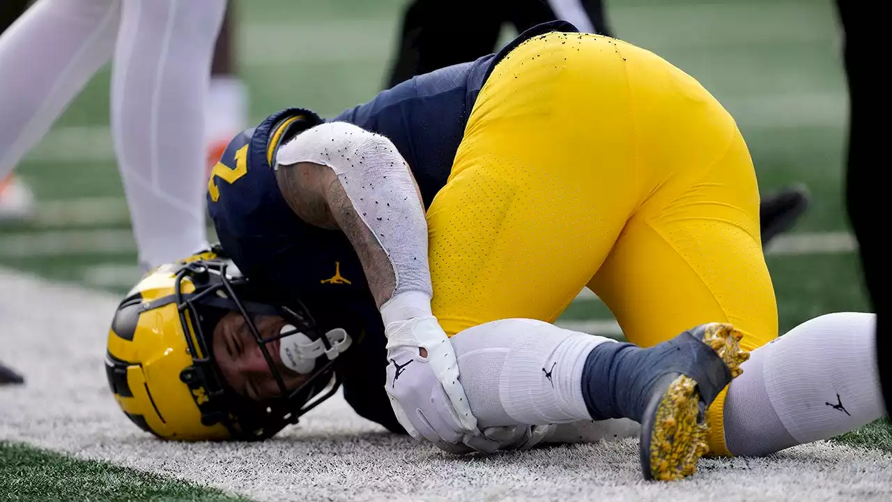 No. 2 Michigan's Heisman hopeful out for season, to undergo knee surgery: report