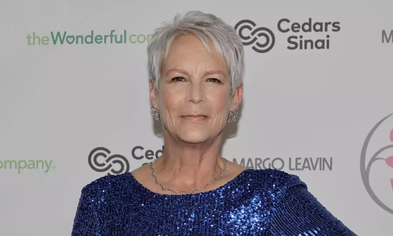 Jamie Lee Curtis dazzles the red carpet in a blue floor-length sequined gown