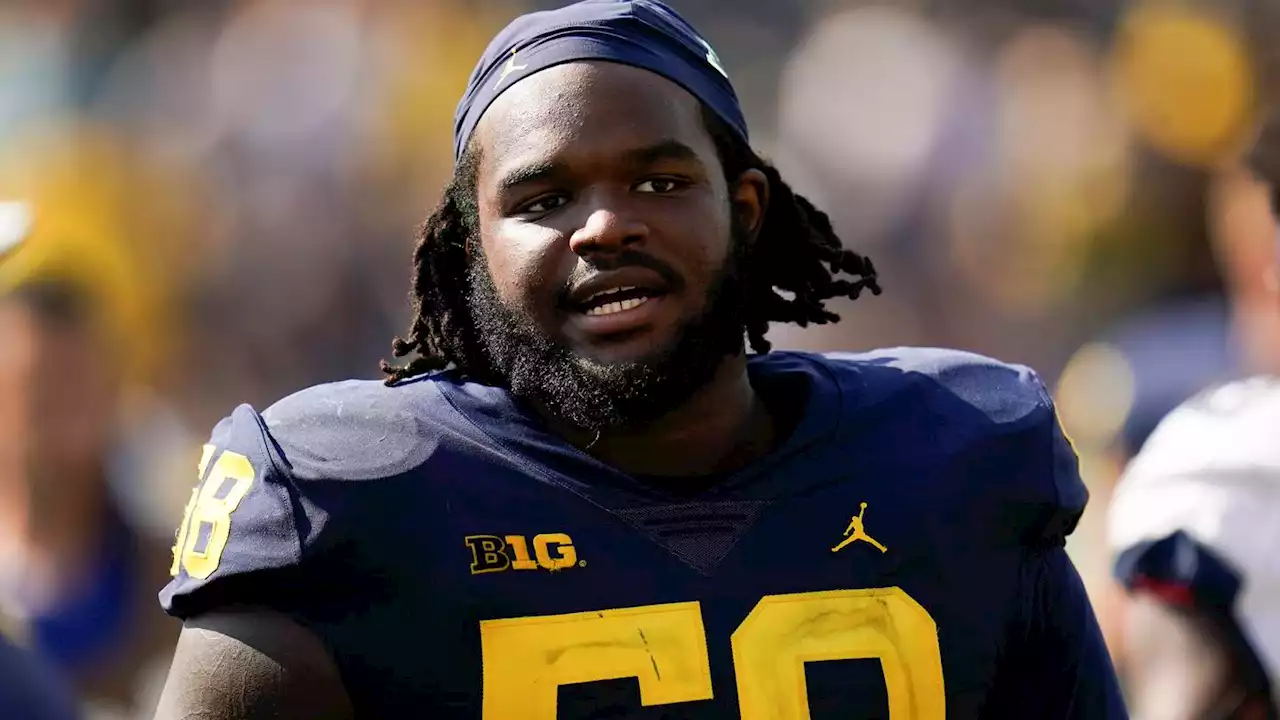 Michigan DL Mazi Smith facing felony weapons charge, will continue to play