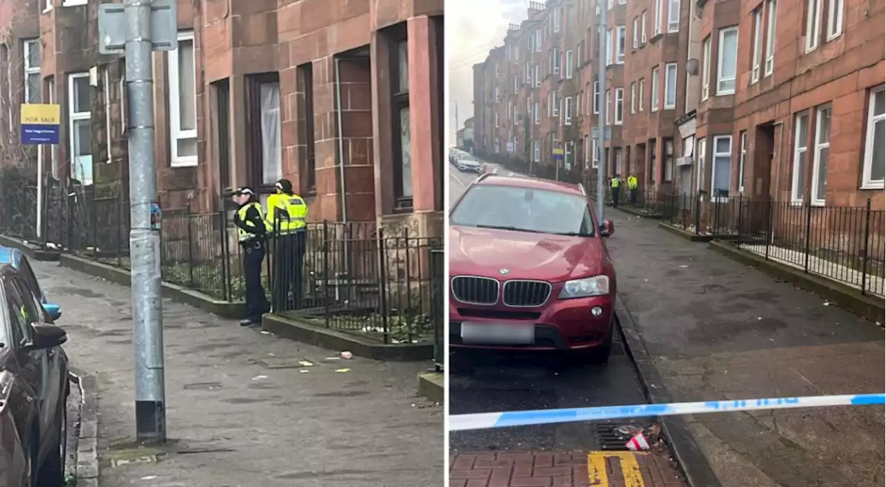 Pictures show Glasgow street taped off after man found dead