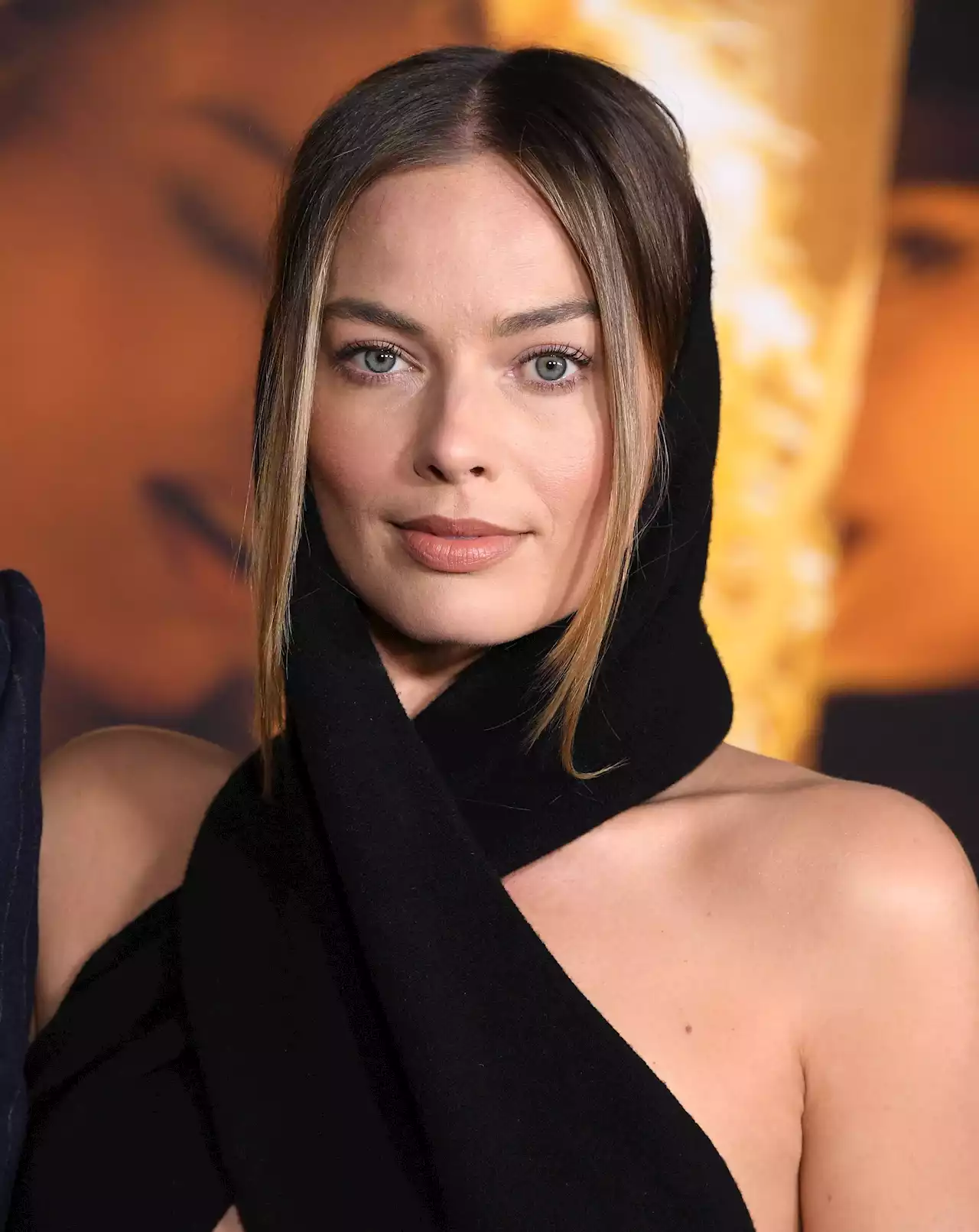 Margot Robbie Addresses Backlash To Her Brad Pitt Kiss Revelation