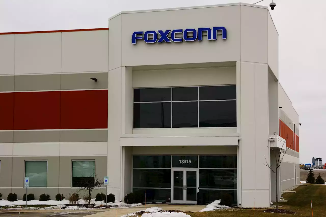 Taiwan to fine Foxconn as it sells Chinese chipmaker stake