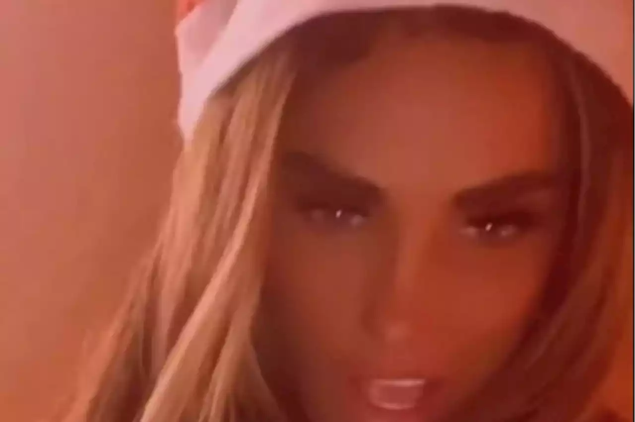 Katie Price shows off biggest ever boob job and sings in crop top and Santa hat