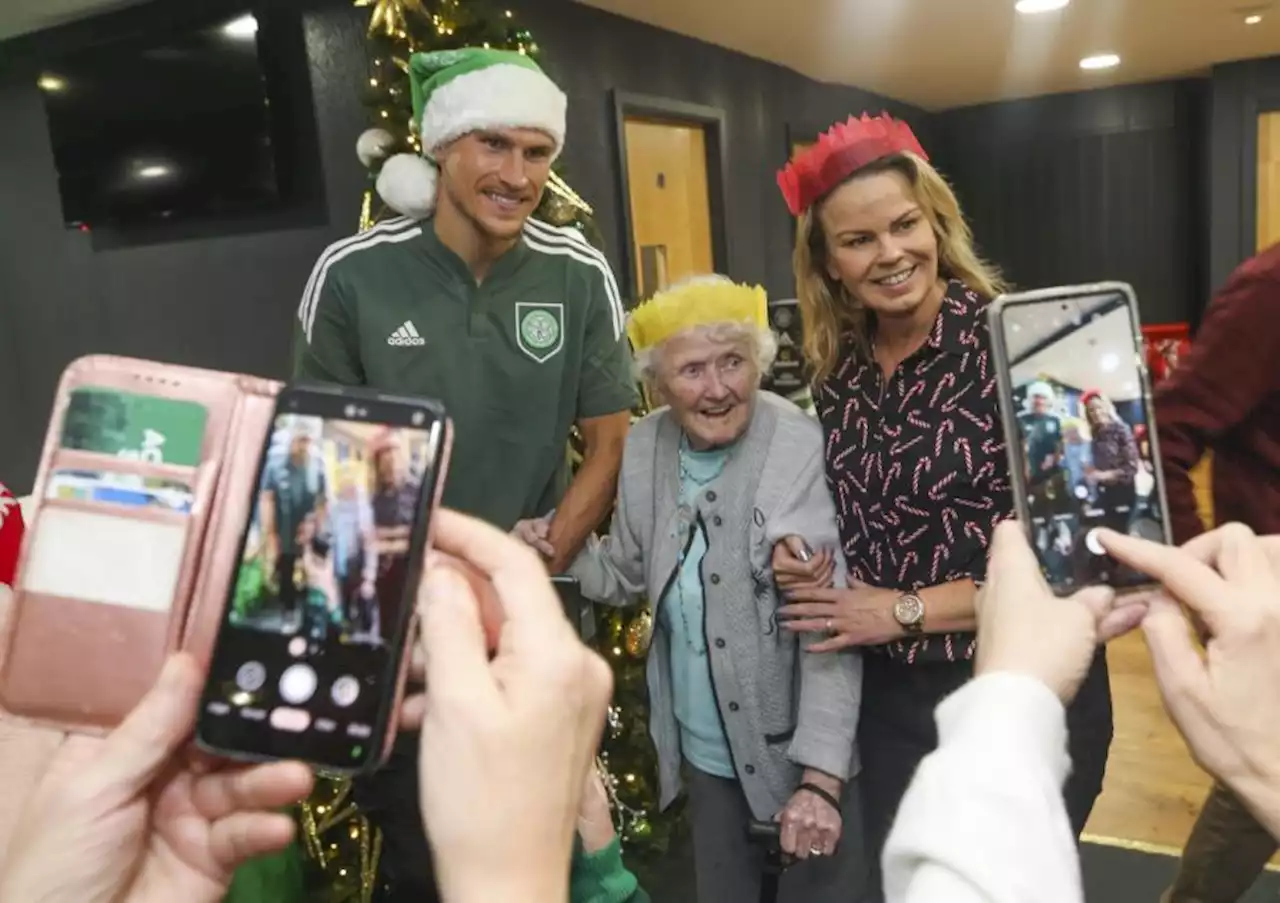 In Pictures: Celtic star attends Christmas party held for elderly people