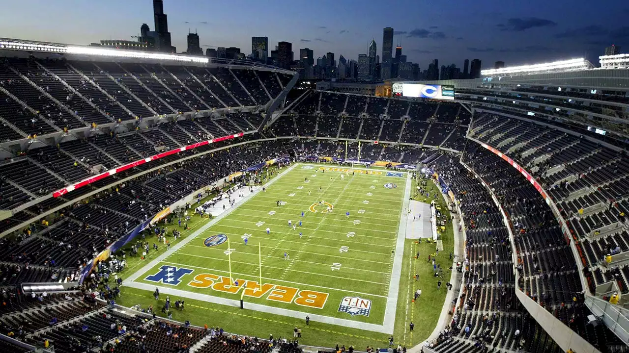 Packers and Bears fans fight in upper deck during NFC North rivals' matchup in Chicago