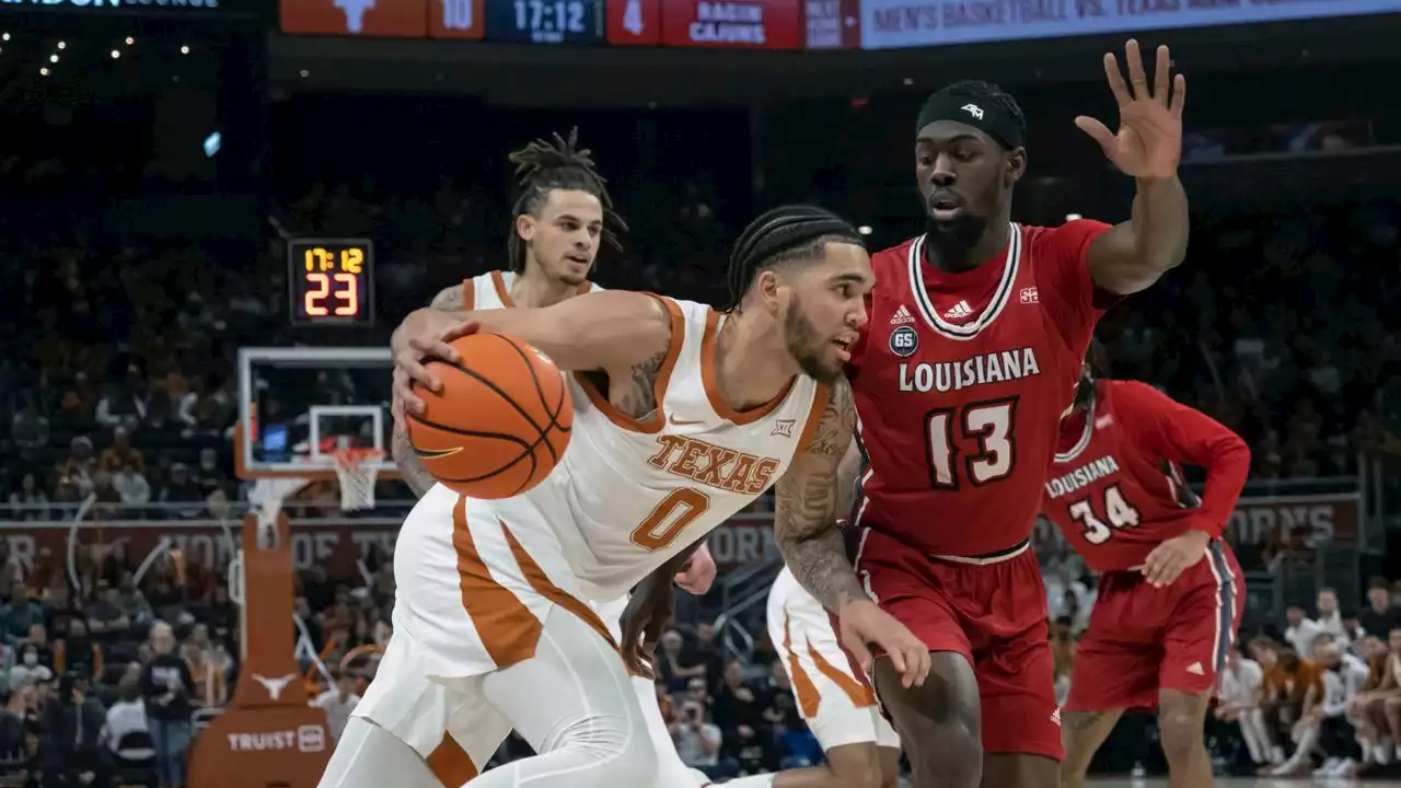 Freshman Morris excels for No. 7 Texas in 100-72 victory