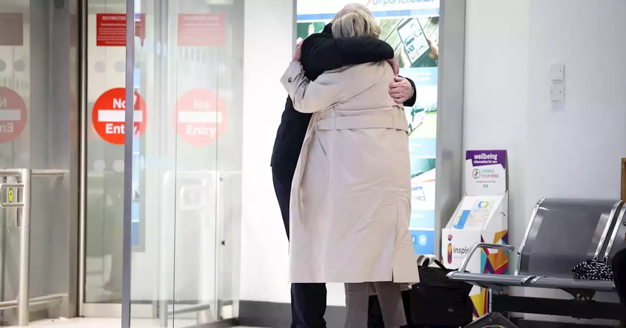 Emotional scenes as families reuite at Belfast City Airport ahead of Christmas