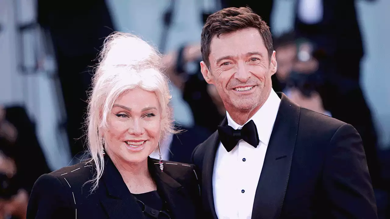 Hugh Jackman and wife Deborra-Lee Furness dance alongside Ryan Reynolds cutout in holiday video