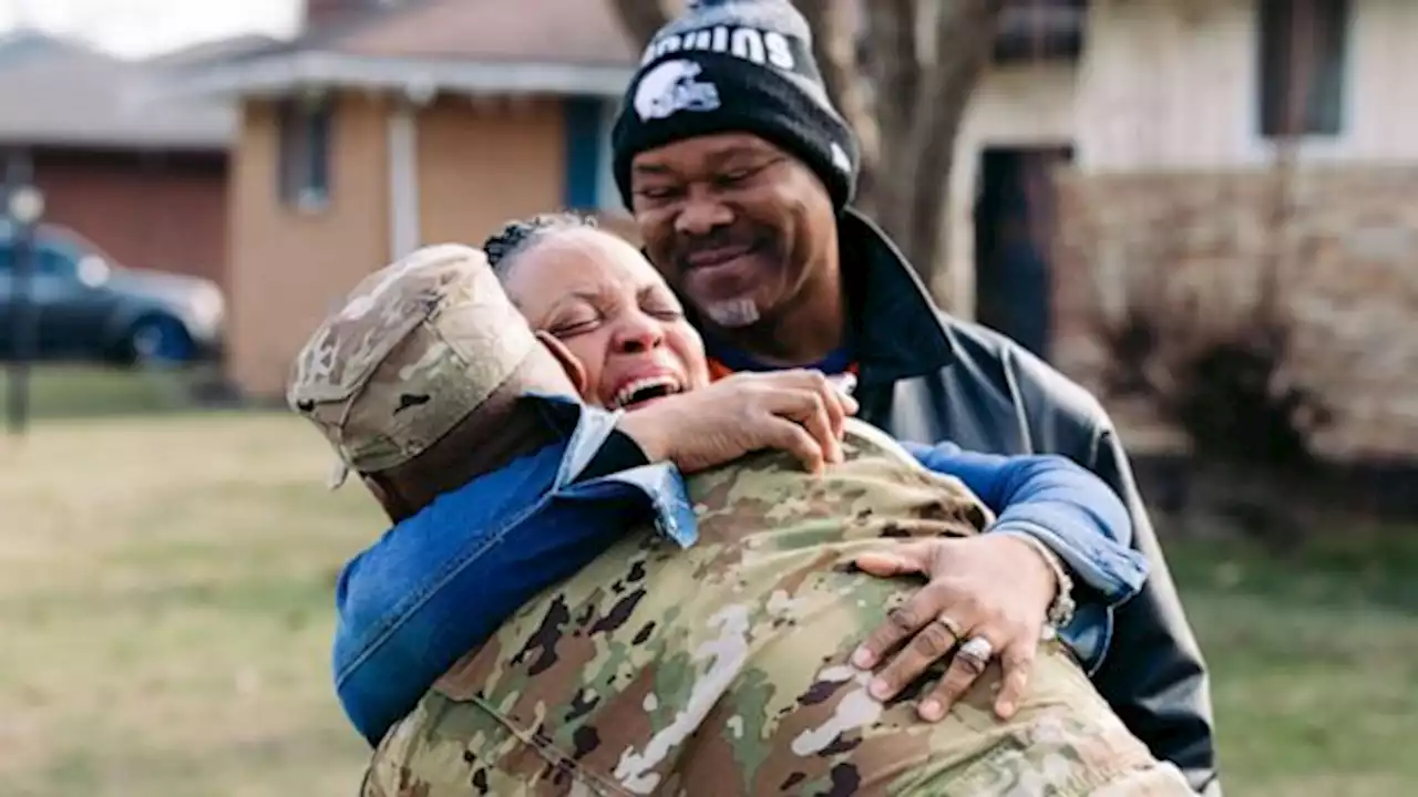 Airman surprises parents for Christmas in emotional reunion