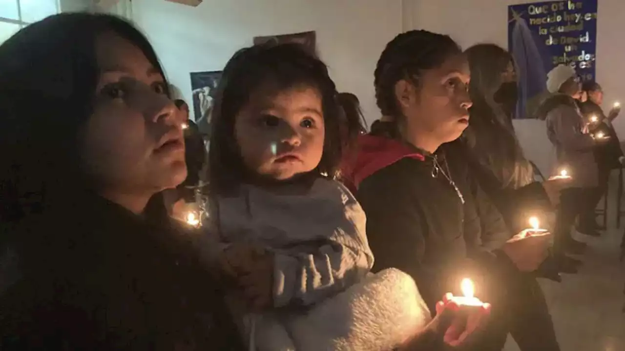 Stuck at the border, migrants find a little Christmas cheer