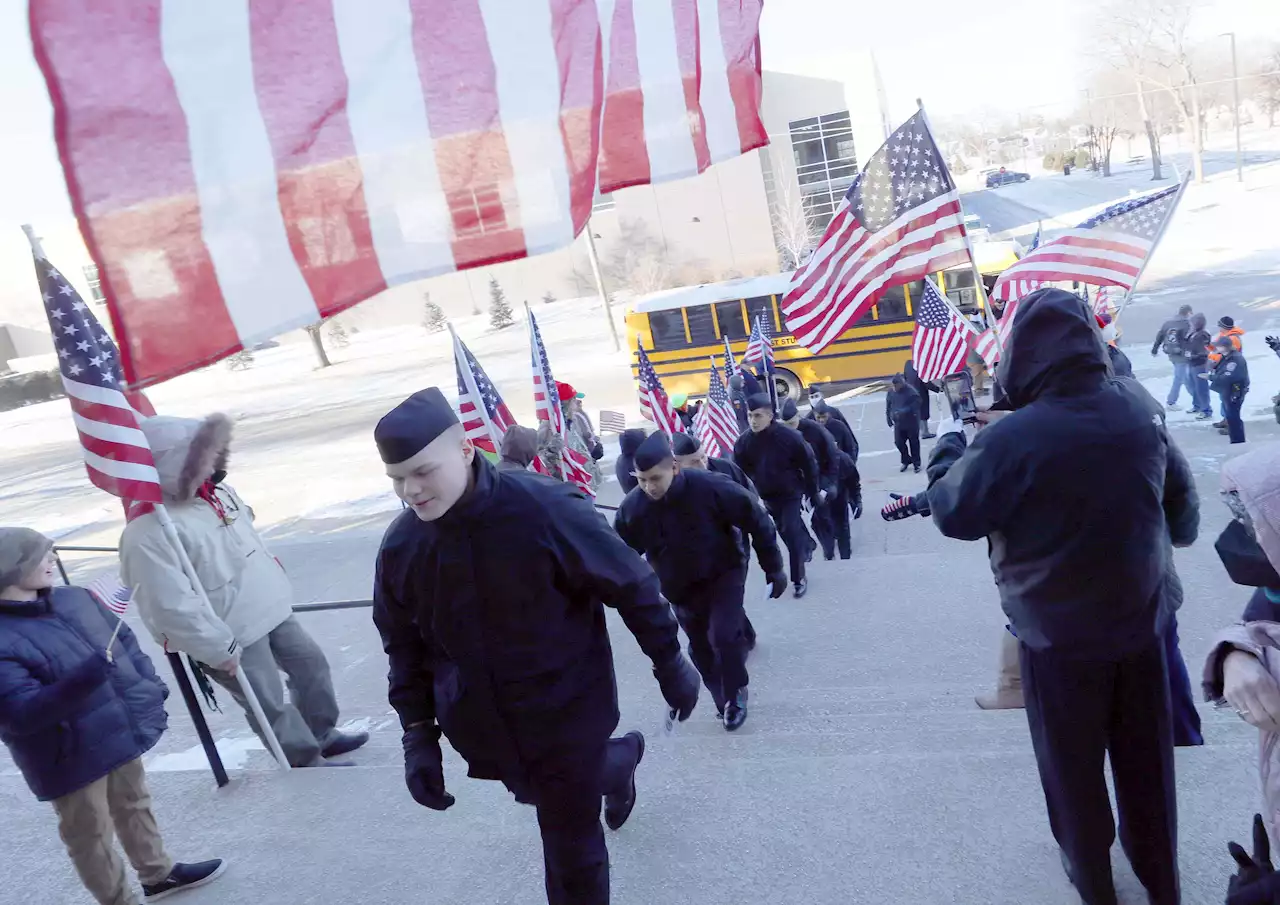 Two Gold Star parents welcome 48 Navy recruits at Christian Liberty Academy for Christmas Day