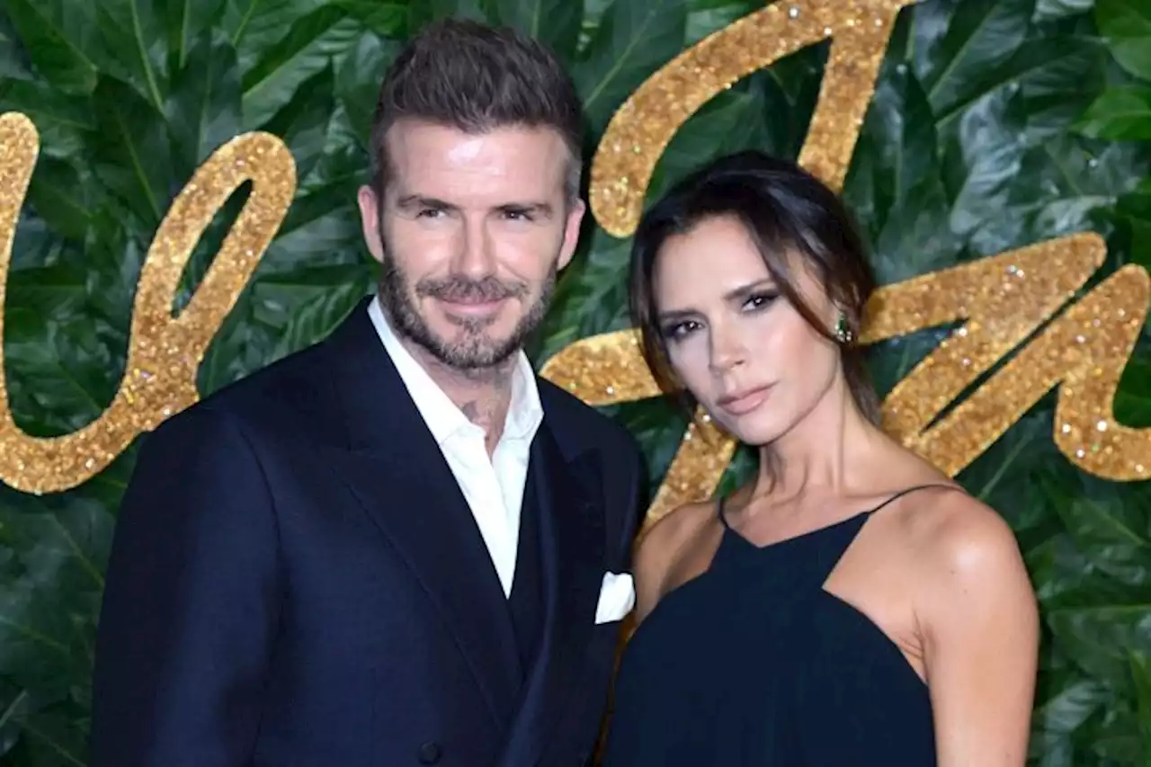 Victoria Beckham Shows Off Her Cheeky Christmas Present From Husband David Beckham As Pair Pose For Adorable Snap