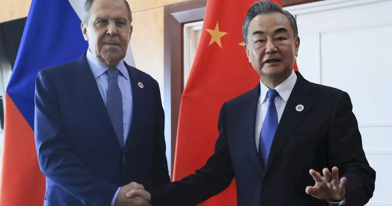 China's foreign minister signals deeper ties with Russia