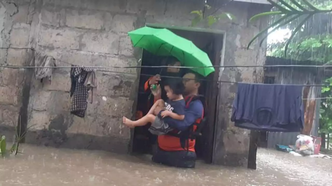 Philippines floods force tens of thousands to flee homes