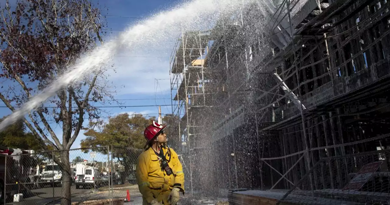 Two firefighters hurt in Pacific Beach blaze that burns three homes, destroys two-story under construction