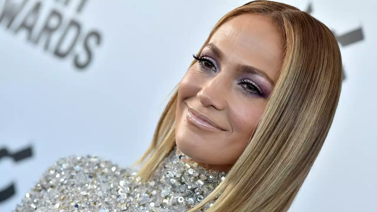 Jennifer Lopez Channeled Wednesday Addams With Her Latest Holiday Look