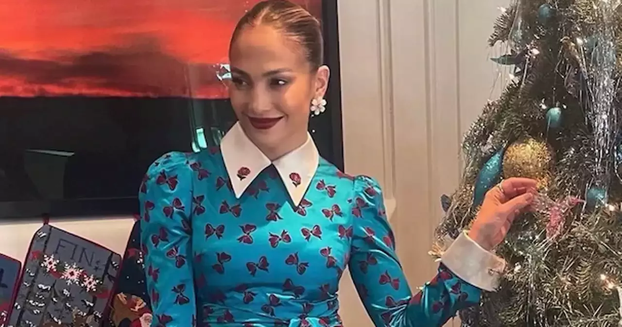 Jennifer Lopez Exposes Legs In Slinky Minidress During Dazzling Christmas Snaps