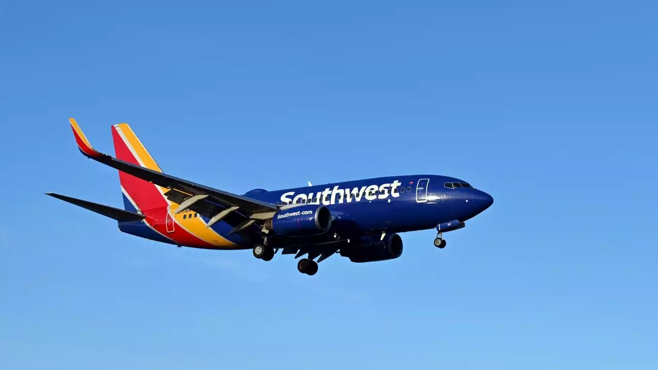 Southwest stock sinks as airline delays, cancelations continue