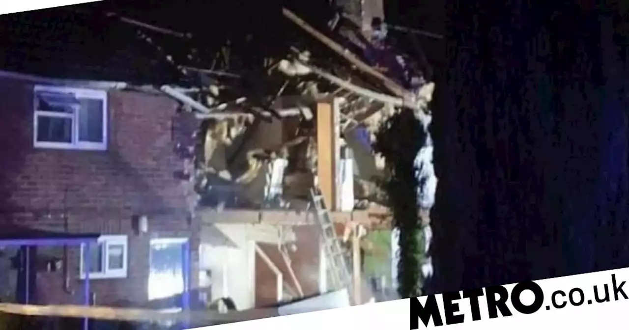 House destroyed and street evacuated after suspected gas explosion