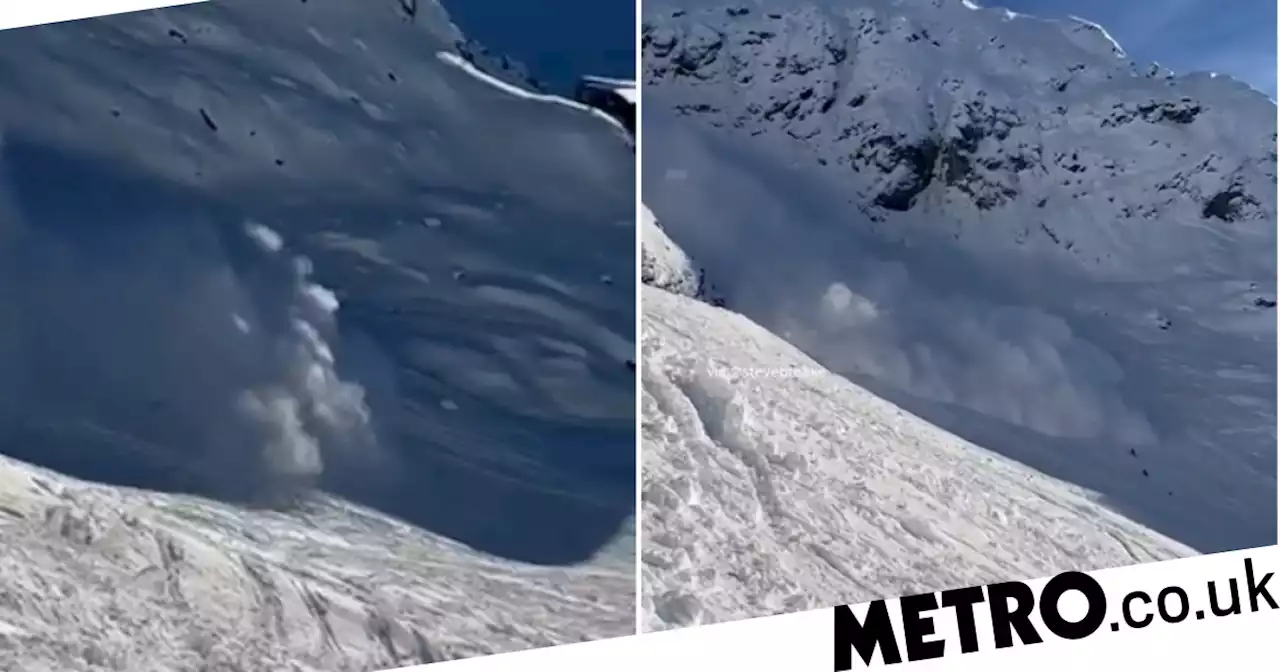 Moment huge avalanche buries skiers with all miraculously found alive