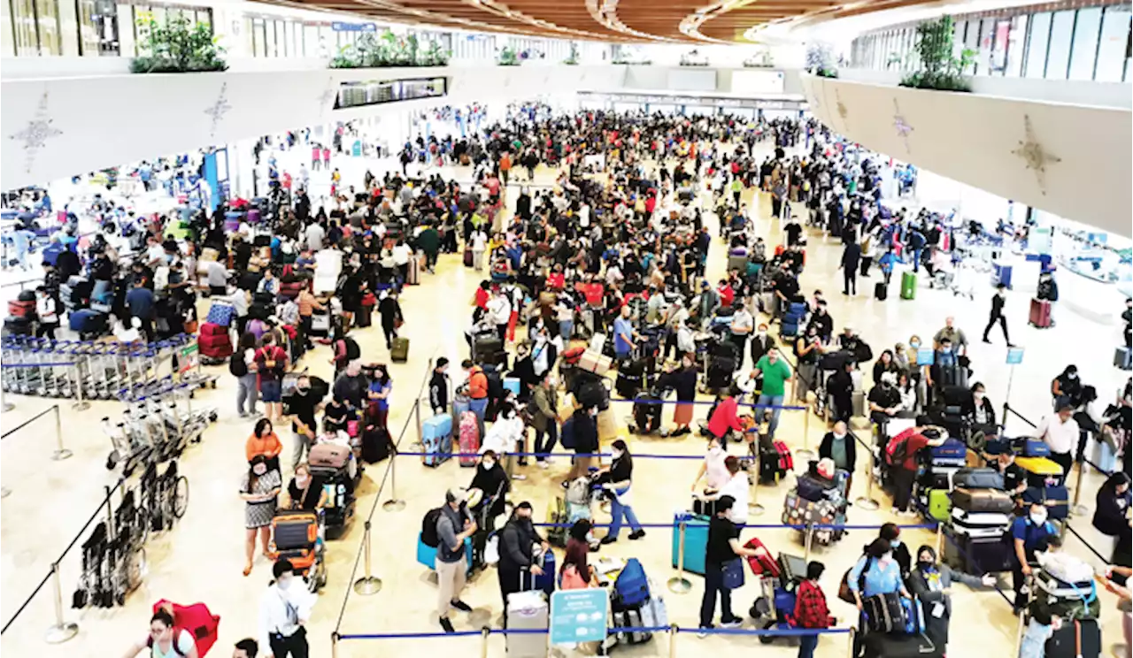 DOTr’s Bautista checks NAIAas holiday tourists exit airports - BusinessMirror