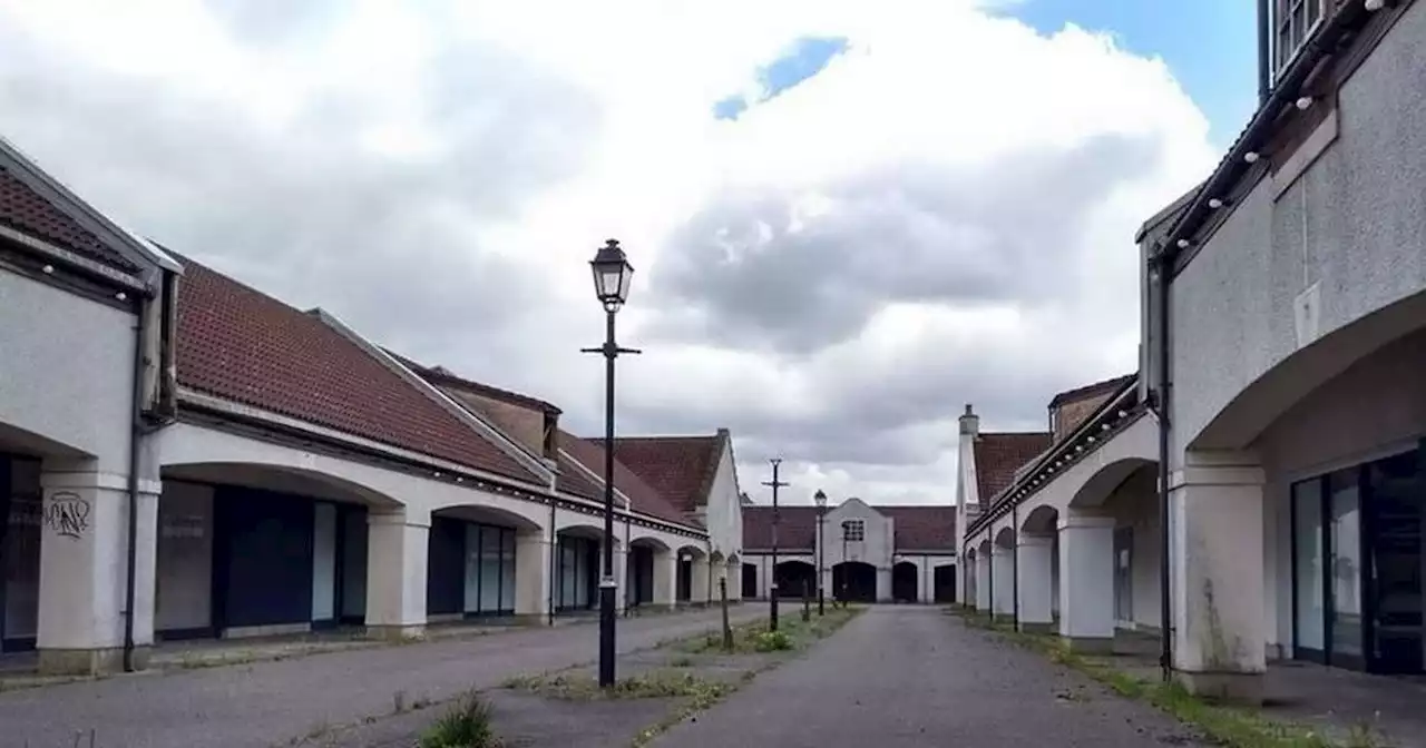 Eerie photos show abandoned shopping village after almost 20 years derelict