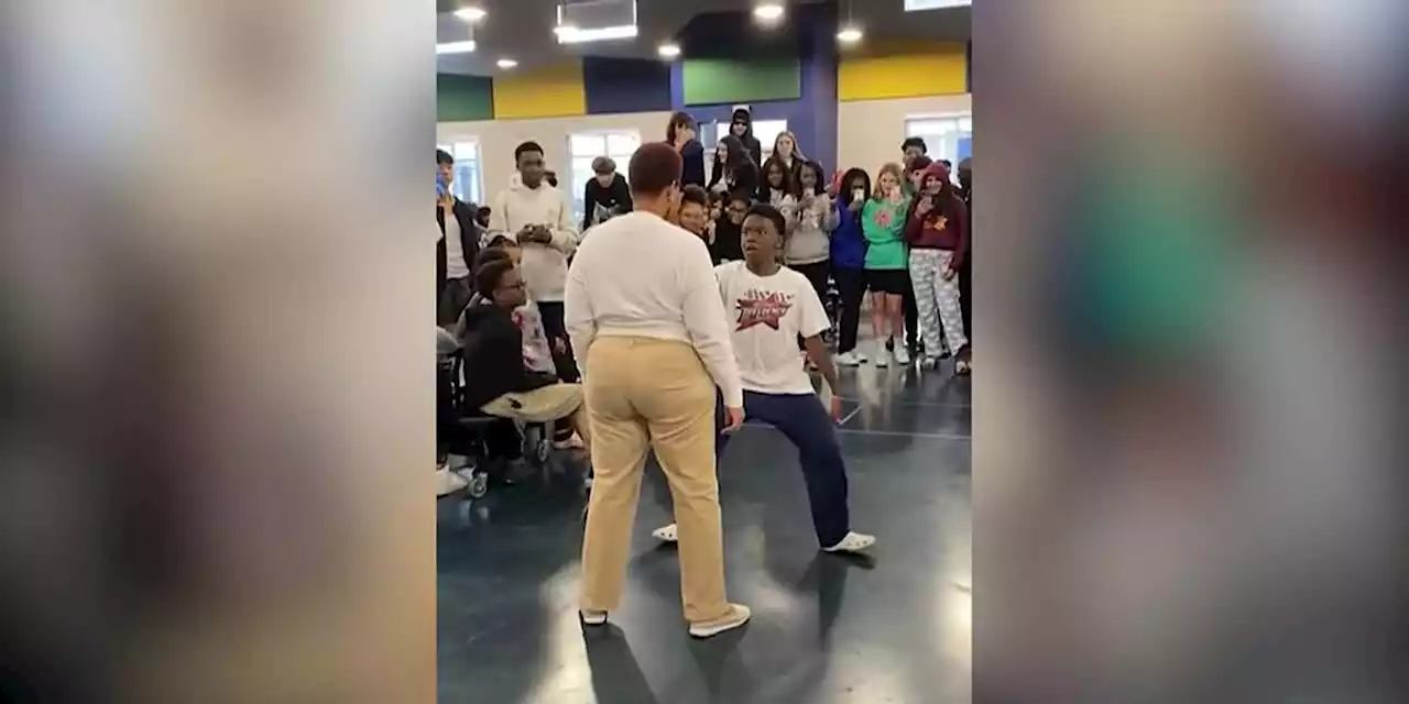 Students challenge teacher to dance-off in viral video