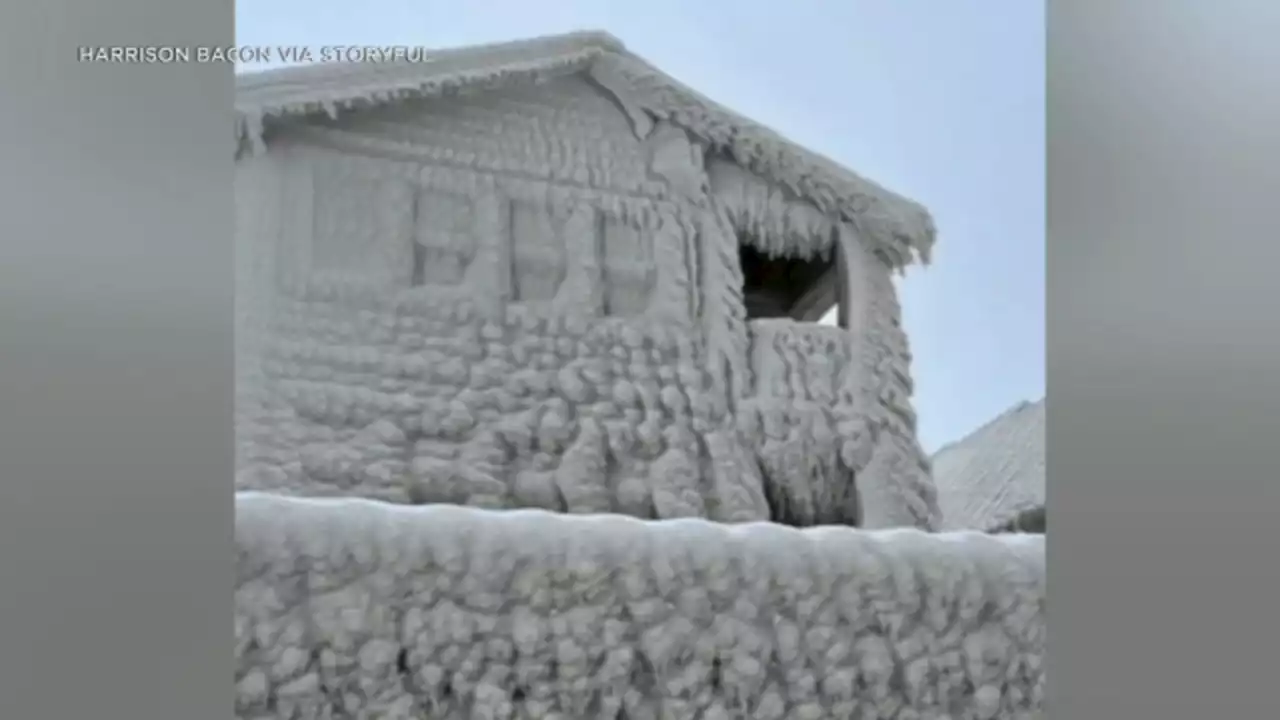 Homes on Lake Erie were encased in ice as blizzard whipped frigid waves onshore