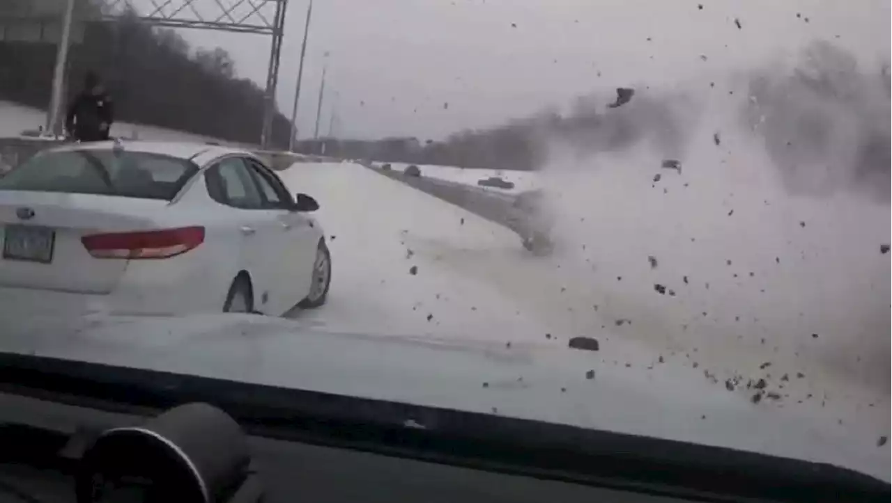 Ohio police officer dodges out-of-control truck on icy road before it slams into cruiser