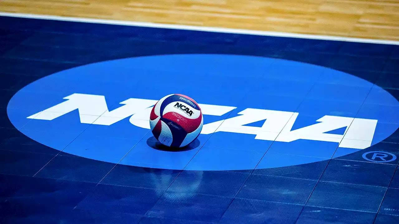 Houston libero Kate Georgiades dives across table to make rally-saving play in NCAA Tournament match