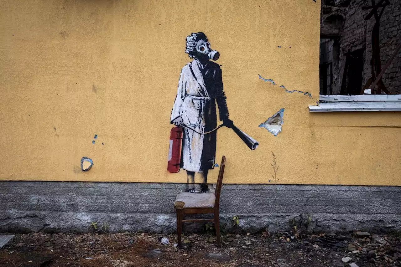 Group cut Banksy mural off battle-scarred Ukraine wall, governor says