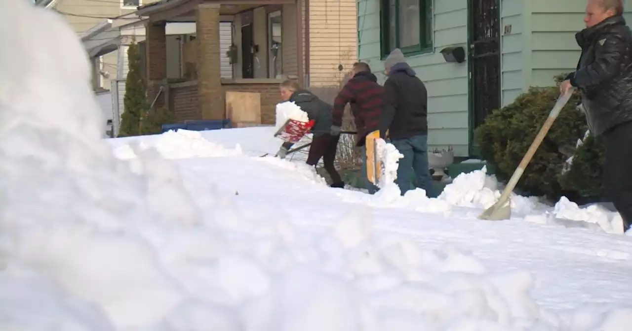 Dozens of volunteers come together to dig out friends and neighbors in East Buffalo