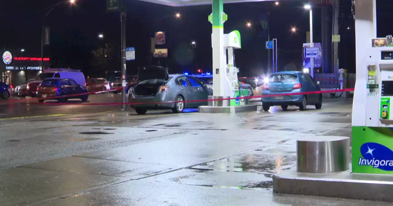 One brother shot at South Side gas station, another arrested after fight with police at scene