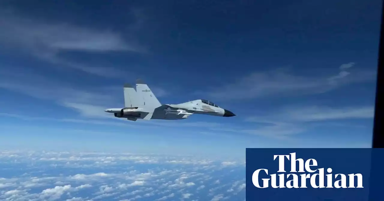 Chinese navy jet flies within 10ft of US air force plane over South China Sea