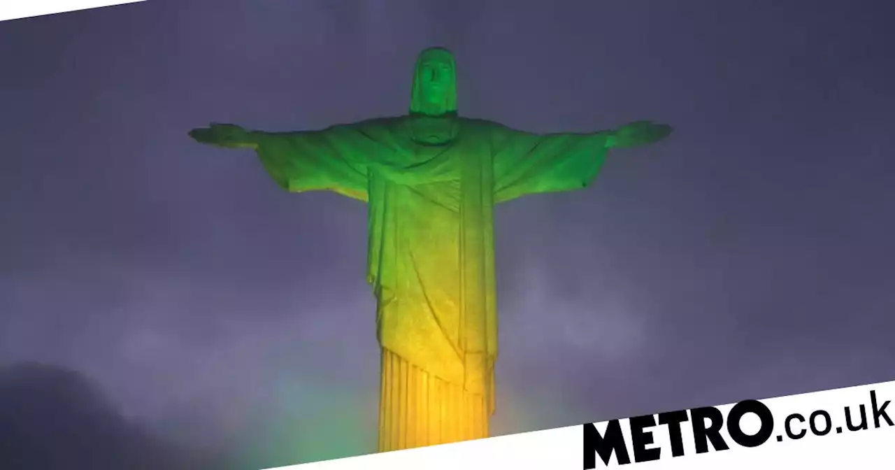 Christ the Redeemer turns green & yellow for Pele as nation mourns death of hero